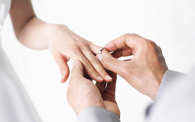 Wedding-Rings-Hands-Groom-Bride